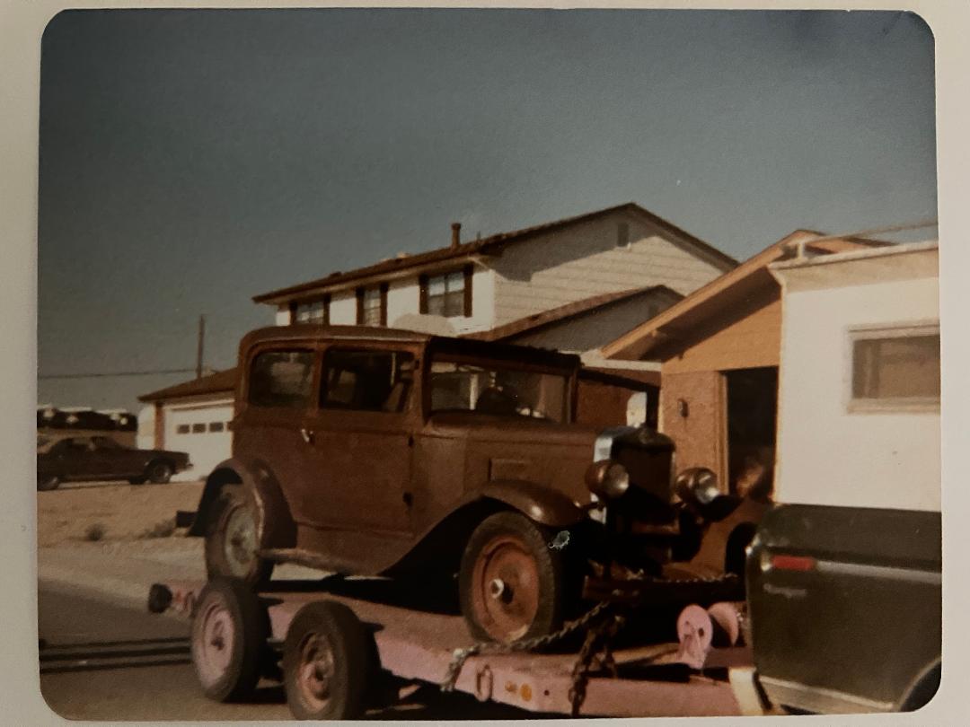 image of a basket case car in neighborhood